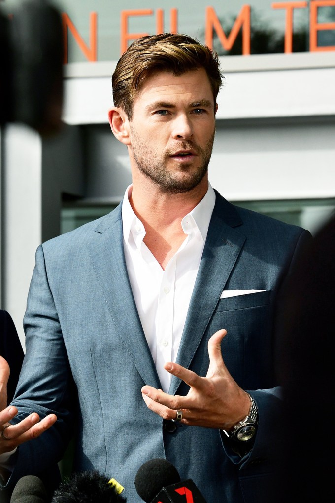 Chris Hemsworth speaking at a press conference in Australia