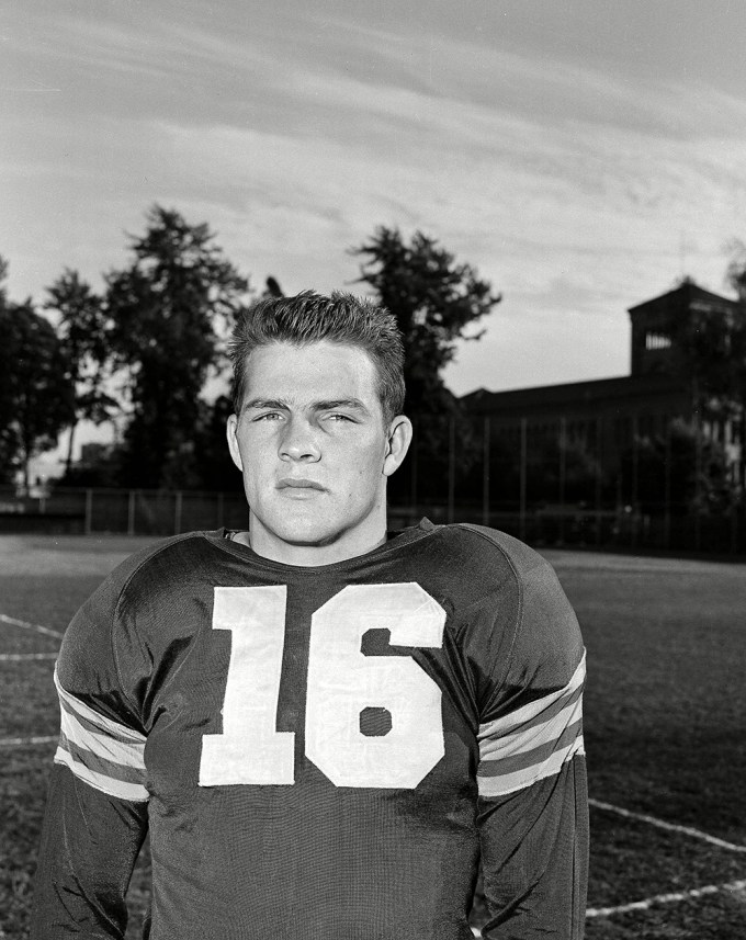Frank Gifford posing for a photo when he played for USC