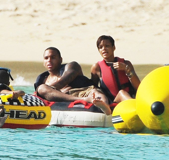 Rihanna & Chris Brown Sunbathe In Barbados