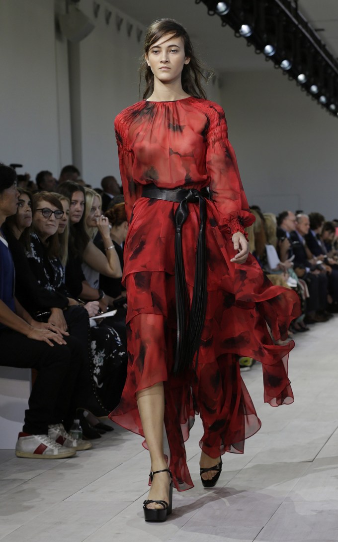 Model in a red dress at Michael Kors Spring 2016
