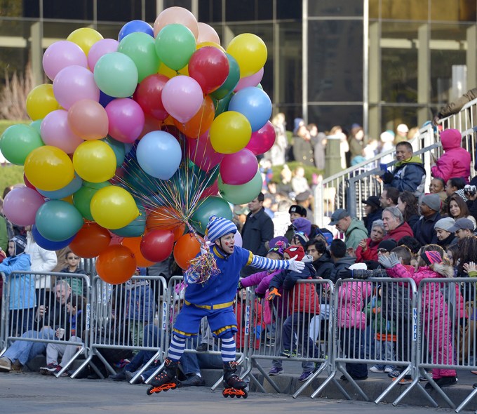 A rollerblading performer excites the Macy’s Thanksgiving Day Parade crowds.