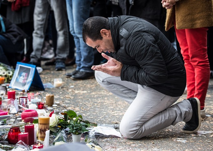 A Mourner Praying In Remembrance