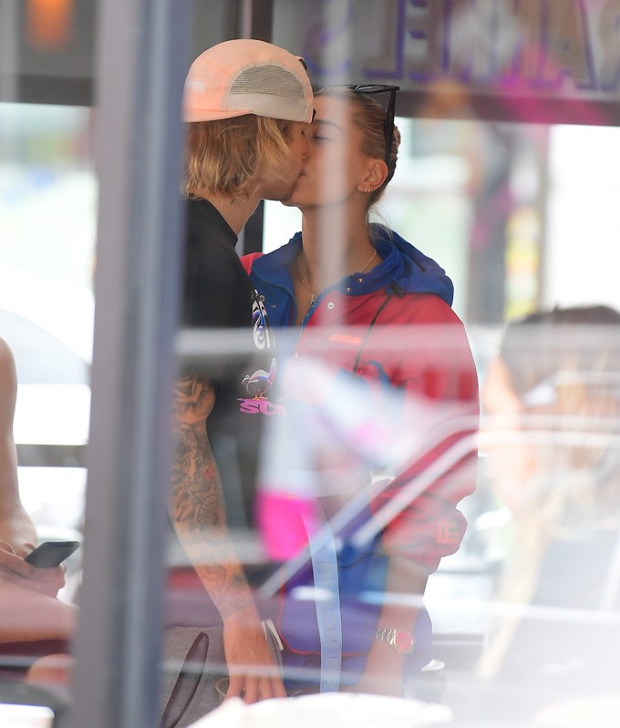 Justin Bieber and Hailey Baldwin kiss during an outing