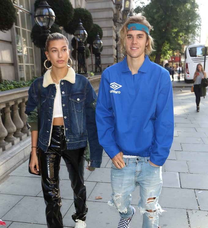 Justin Bieber and Hailey Baldwin walk outside