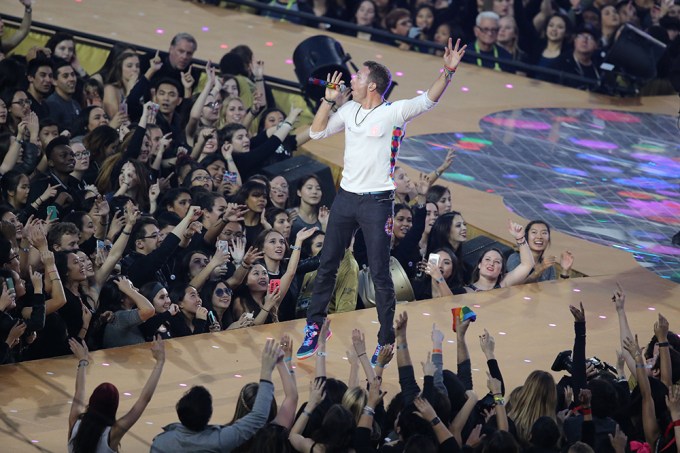 Chris Martin of Coldplay Performing at the Super Bowl Halftime Show