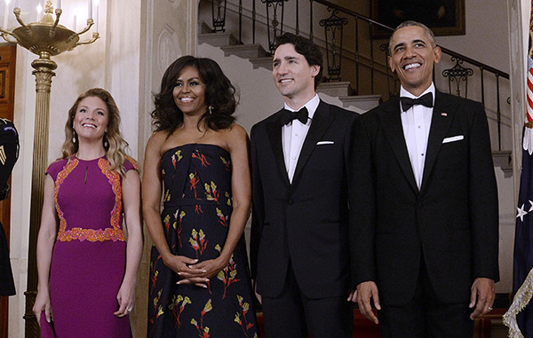 Justin Trudeau alongside Michelle and Barack Obama