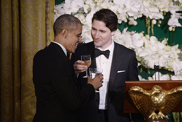 Justin Trudeau and Barack Obama toast