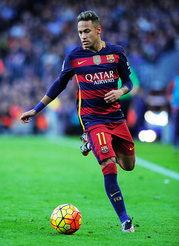 Neymar eyes the ball