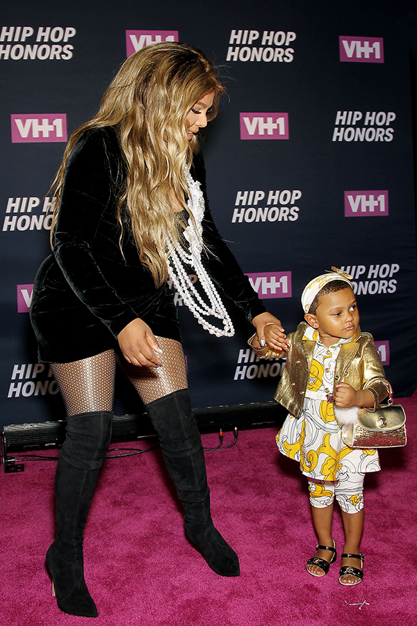 Lil’ Kim With Royal Reign
