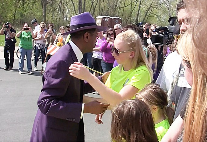 Larry Graham and Prince’s friends hug fans outside the Paisley Park Studios