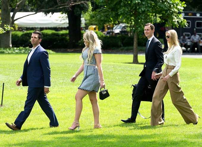 Donald Trump’s kids and son-in-law walking outside the White House
