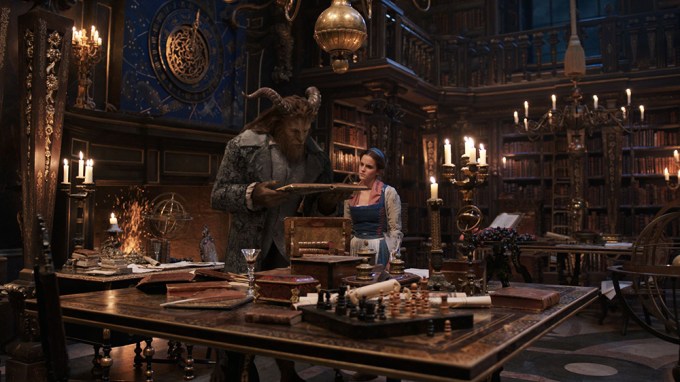 The Beast Shows Belle His Library