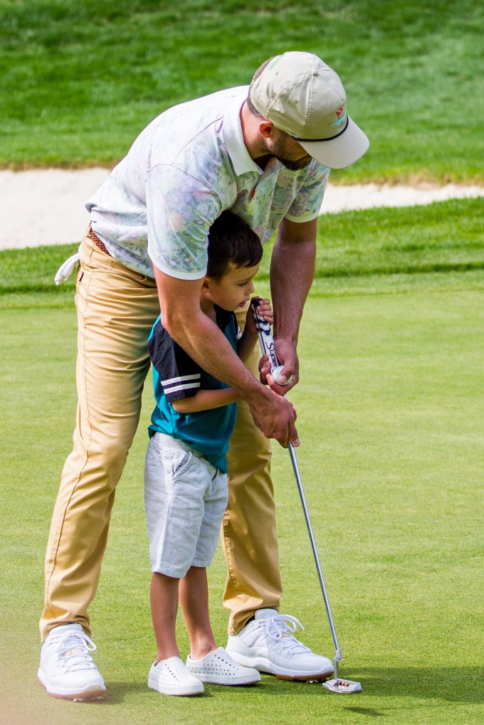 Justin Timberlake teaches son Silas how to golf at the Omega European Masters