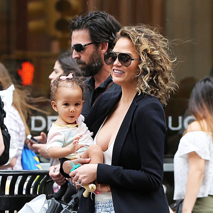 Chrissy Teigen and her daughter Luna eat lunch at Lure and shop at Dean and Deluca in Soho in New York City
