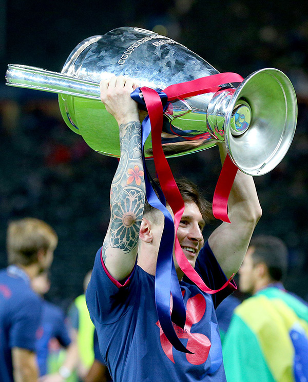 Lionel Messi with a trophy