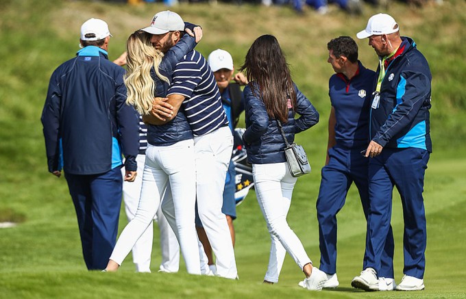 Paulina Gretzky and Dustin Johnson hugging at the 2018 Ryder Cup