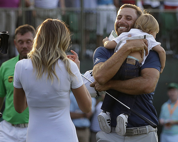 Paulina Gretzky and Dustin Johnson during an outing with their son Tatum