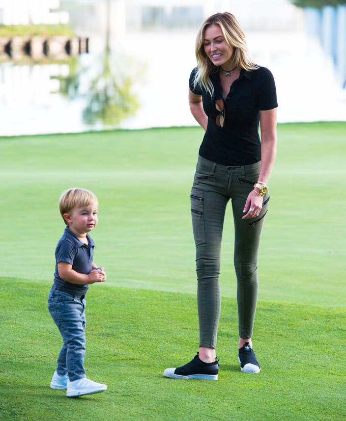 Paulina Gretzky and her son, Tatum at a golf tournament