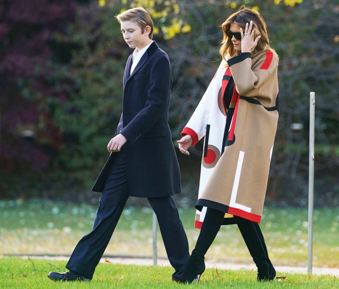 Barron Trump Walks With His Mom