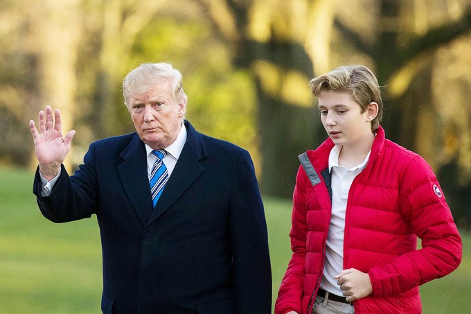 Barron Trump Wears A Red Puffer Jacket With Donald