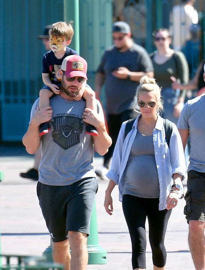 EXCLUSIVE: Carrie Underwood and Mike Fisher take their son on his first trip to Disneyland