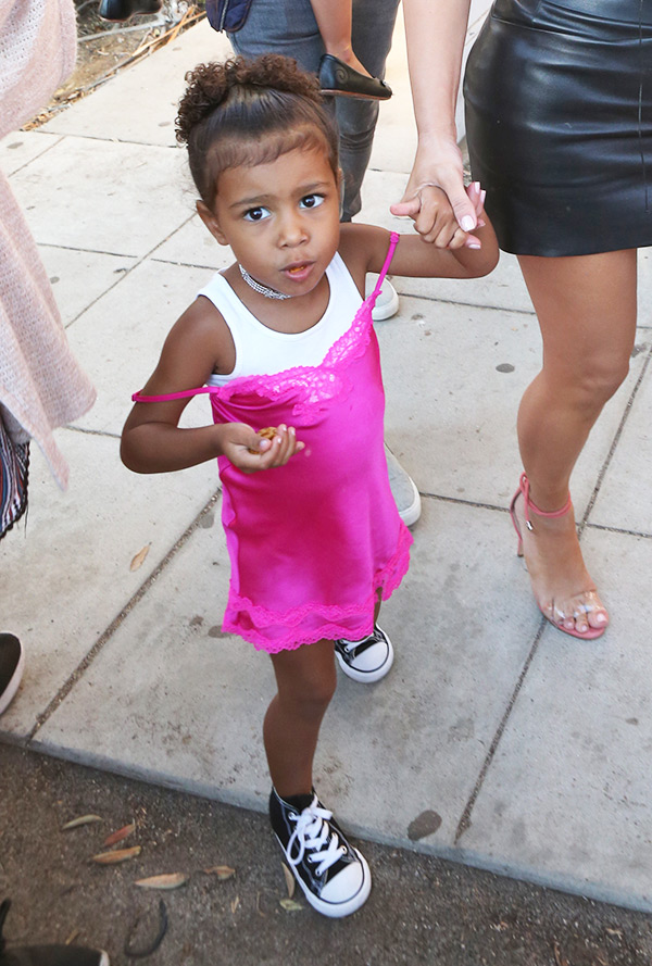 North West Wearing A Pink Dress