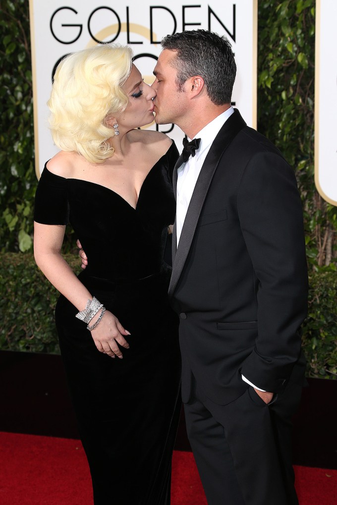 Lady Gaga & Taylor Kinney Kiss At Golden Globes