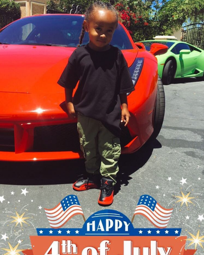 Tyga celebrates the 4th of July with his son