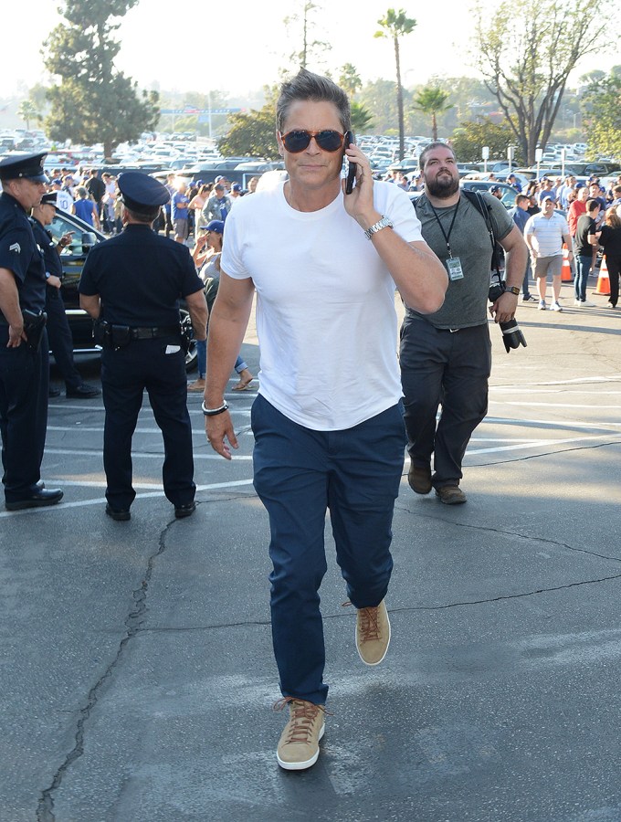 Rob Lowe on his phone while at MLB World Series in LA