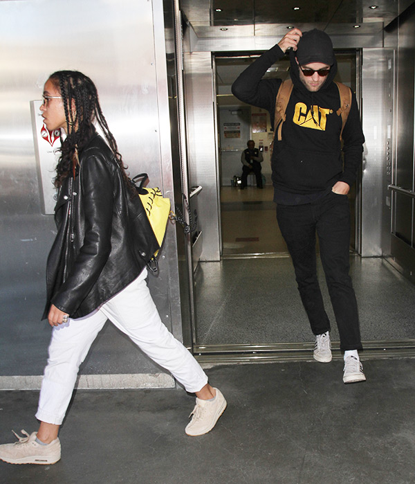 Robert Pattinson & FKA Twigs Arriving At Airport