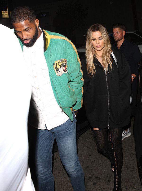 Khloe Kardashian & Tristan Thompson walk during an outing