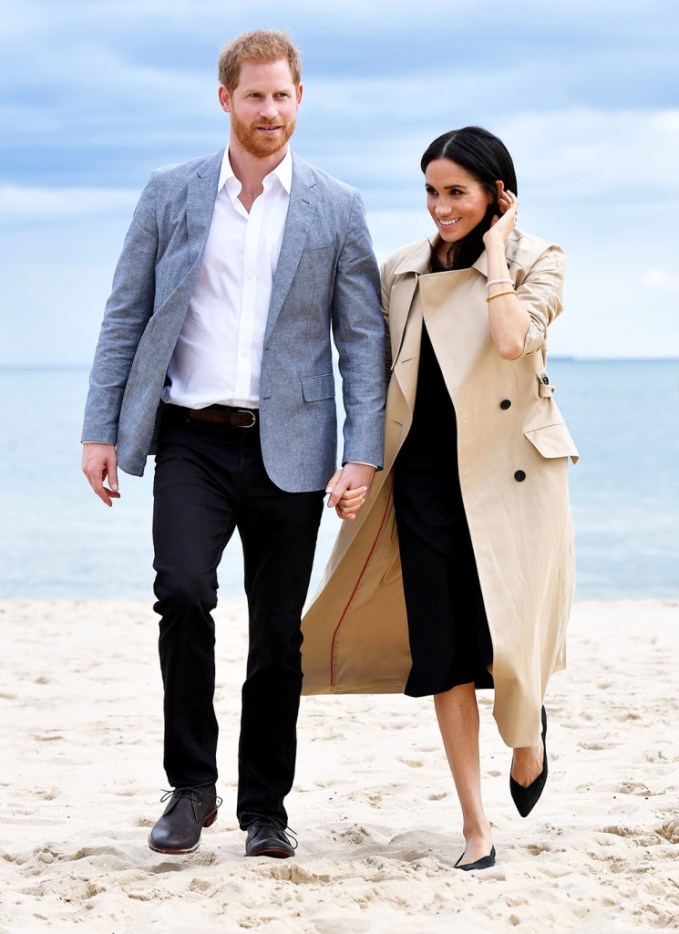 Prince Harry & Meghan Markle walking on sand