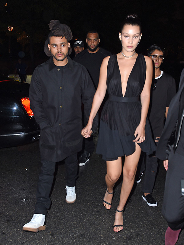 Bella Hadid & The Weeknd hold hands on a date