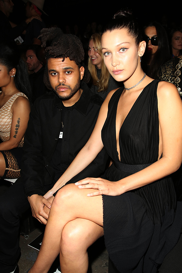Bella Hadid & The Weeknd hold hands at an event