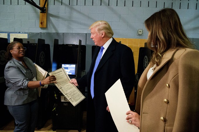 Donald Trump And Melania Trump Pictured With An Election Worker
