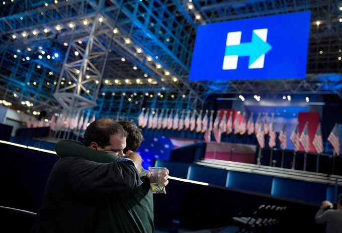 Two Men Embrace During Election Night