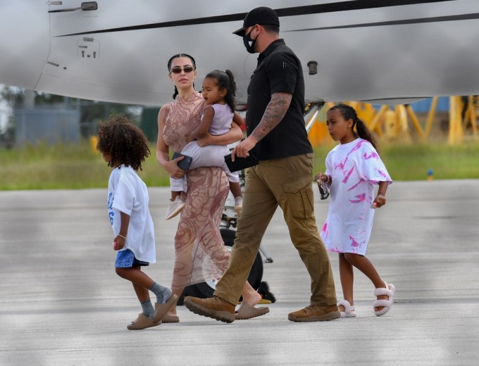 Kim & Kanye Arrive In Miami