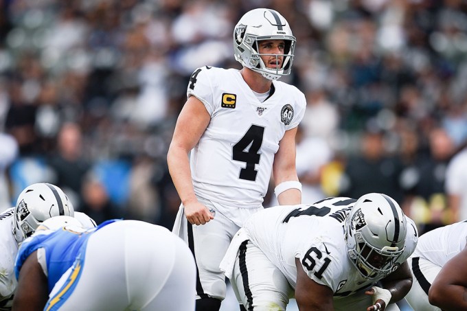 Raiders QB Derek Carr Getting Ready For a Play Against the Chargers in 2019