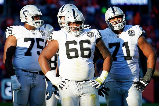 Gabe Jackson Standing With His Raiders Teammates During a Battle With the Broncos