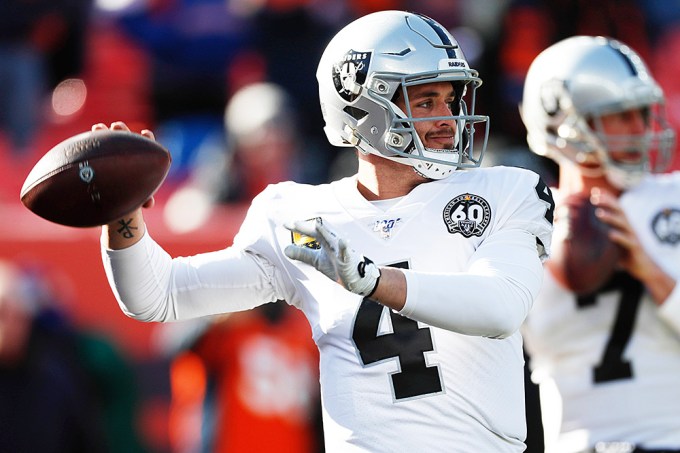 Derek Carr in the Midst of a Throw in 2019
