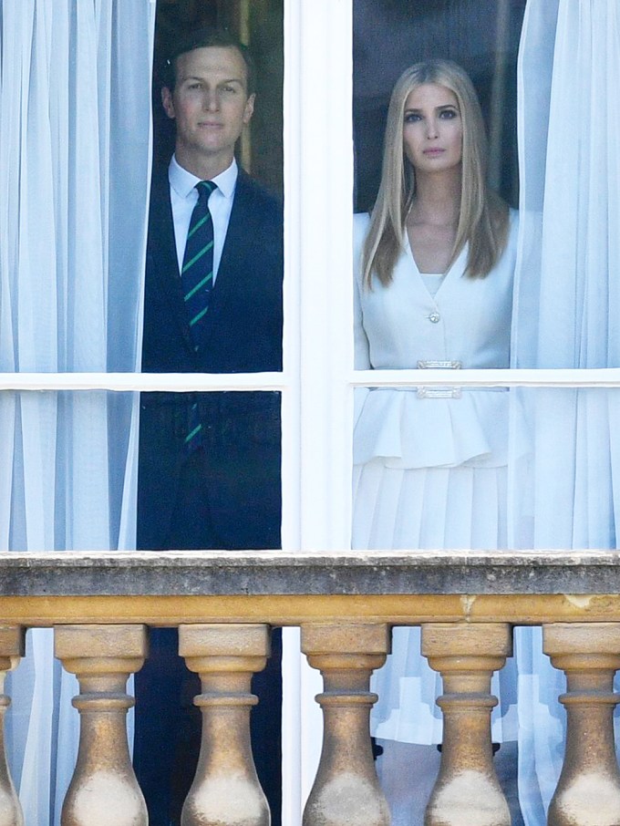 Ivanka Trump & Jared Kushner in a window