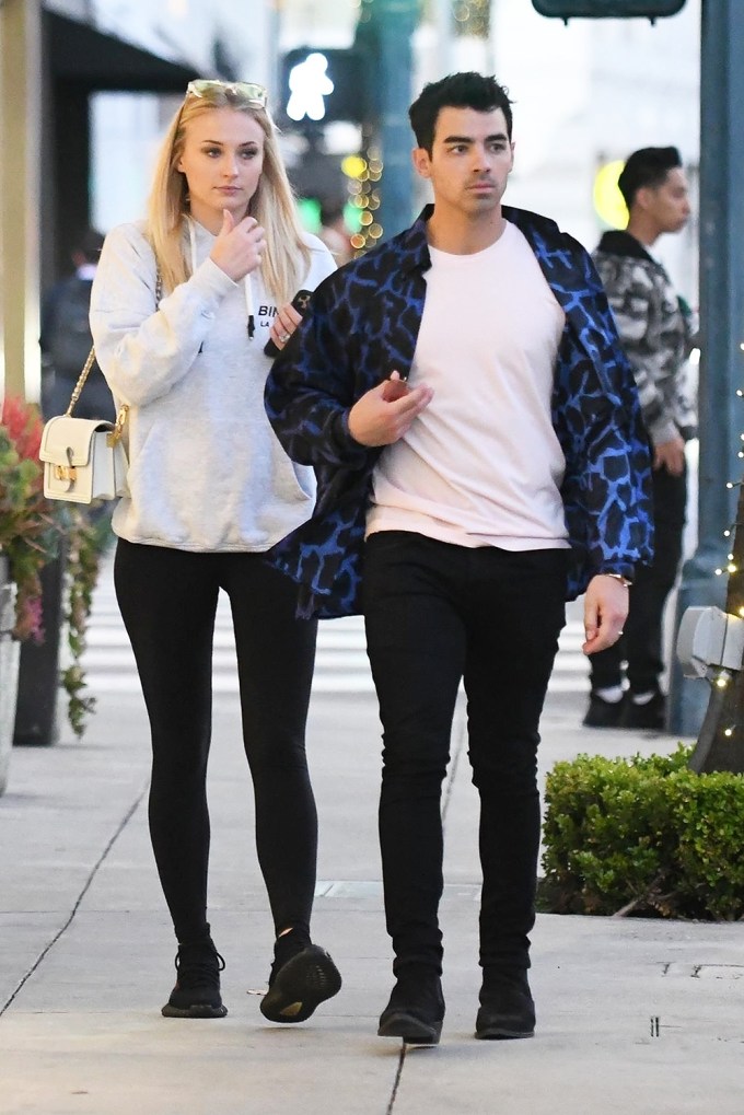 Joe Jonas and Sophie Turner walk side by side