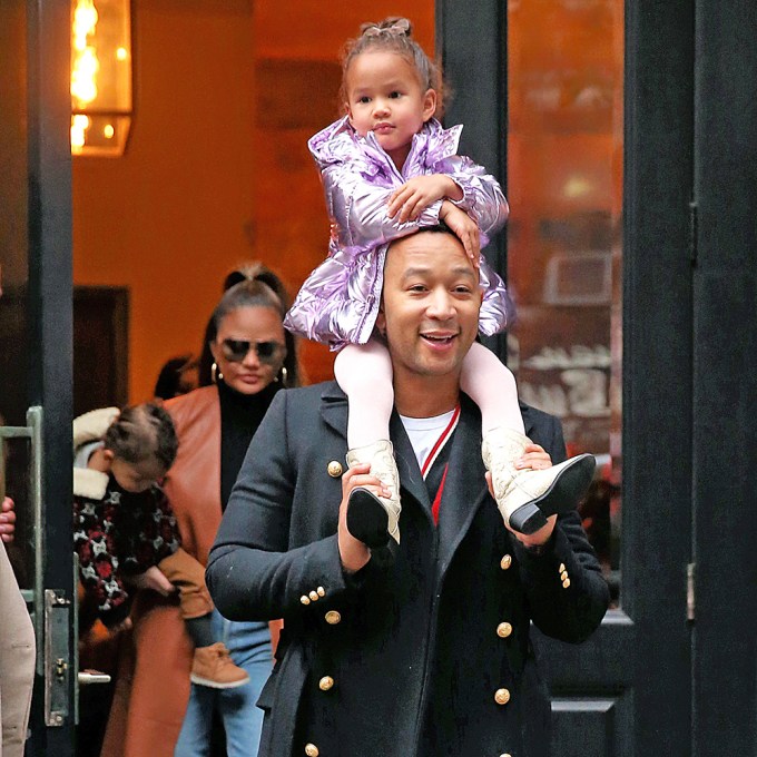 John Legend Carries Daughter Luna On His Shoulders in NYC
