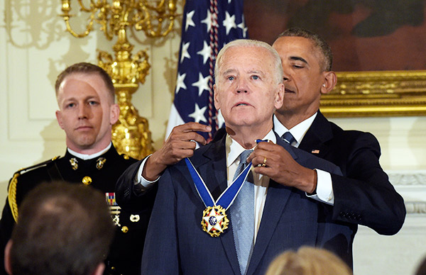 joe-biden-obama-surprise-medal-ap