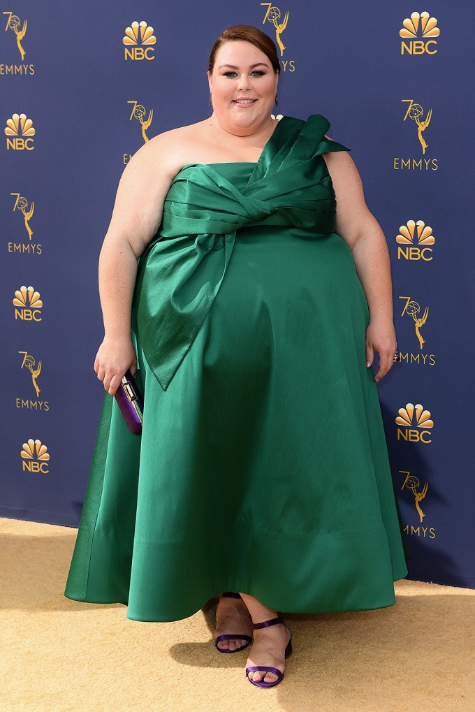 Chrissy Metz in a one-shouldered green gown