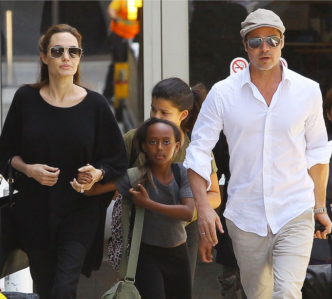 Zahara Jolie-Pitt with parents Brad and Angelina