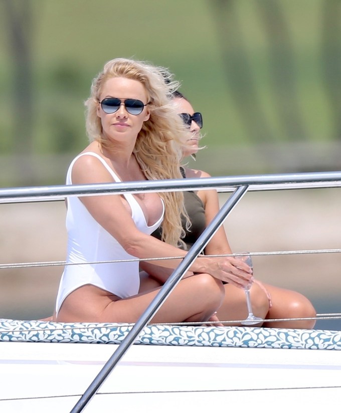 Pamela Anderson poses in swimsuit for a photoshoot on the Gold Coast