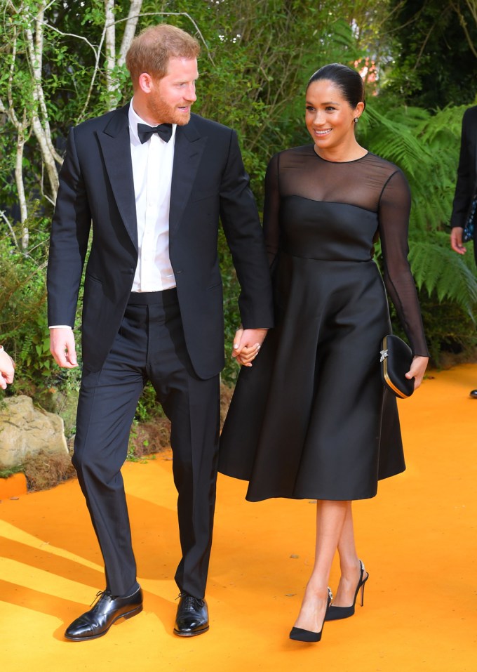 Prince Harry and Meghan Markle walk into ‘The Lion King’ film premiere
