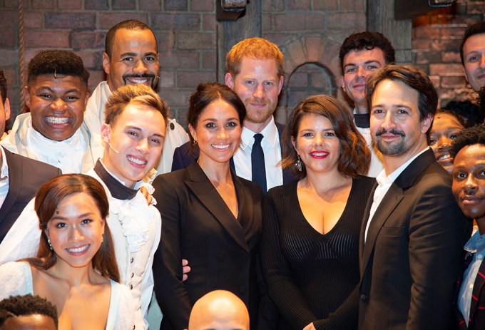 Prince Harry & Meghan Markle pose with the cast of ‘Hamilton’