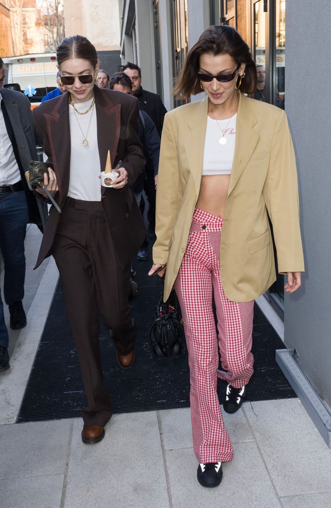 Gigi & Bella Hadid Arrive For Milan Fashion Week